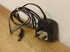 DVE AC Adaptor, Model: DVR 1230UK 4114, Input: 230v 50Hz70mA : 12V 300mA