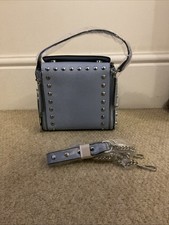 This Light Blue Handbag