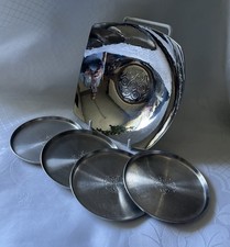 Five pieces of Keswick School of Industrial Arts stay bright.