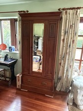 Small Wooden Carved Wardrobe With Drawer, Hanging Area And Mirrored Door