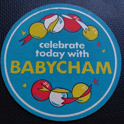 Babycham beer mat showerings - beer,