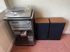 Toshiba SR-Q550 turntable with Aurex tuner and amplifier. Glass cabinet included