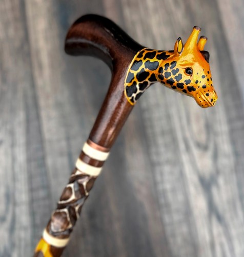 Giraffe walking stick hand - giraffe,