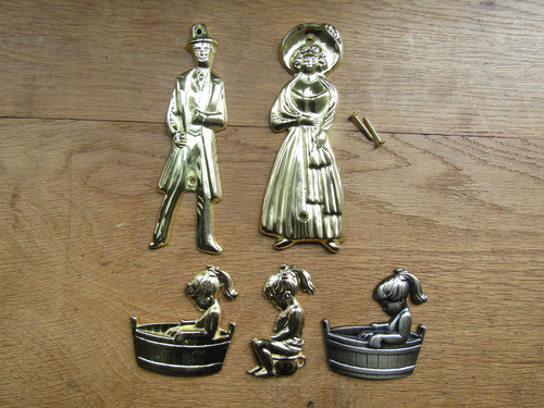 Vintage metal toilet sign