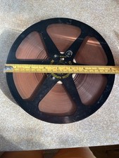 One 8.25 inch Ferrograph take up reel to reel spool. Good used condition.