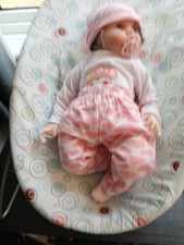 22" Doll Wearing A Pink/white