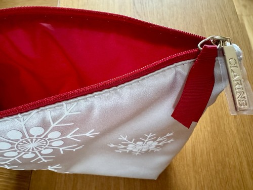 New clarins cream and red - clarins,