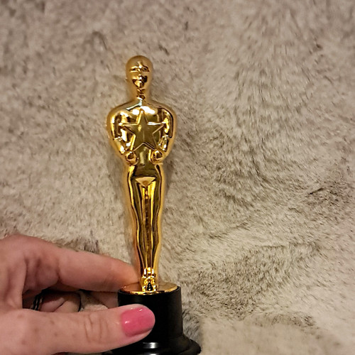Gold plastic trophy figure - gold,