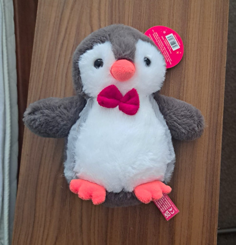 With snuggles plush penguin - with,