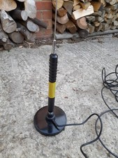 Vintage CB Magmount car aerial with long coax cable to it.