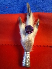EDINBURGH ASSAY SILVER GROUSE FOOT BROOCH WITH LARGE FACETED AMYTHIST STONE.