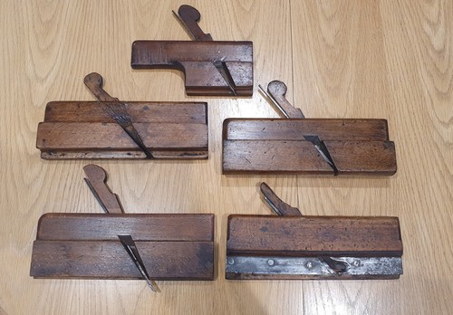 Five antique carpenters - five,