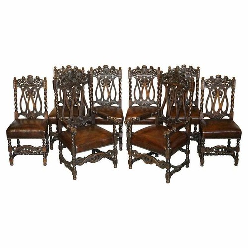 Eight hand carved armorial - hand,