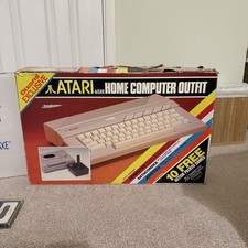 Atari 65XE boxed with cassette and joysticks
