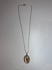 THIN SILVER TONE CHAIN WITH LOCKET PENDANT ENCASING PRESSED FLOWERS