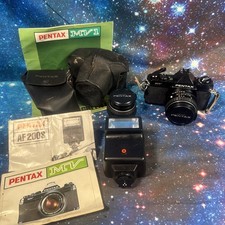 Vintage PENTAX MV1 35mm film SLR camera kit with lens and extras