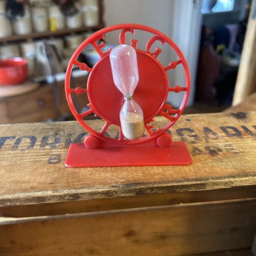 Vintage red hard plastic egg - plastic,
