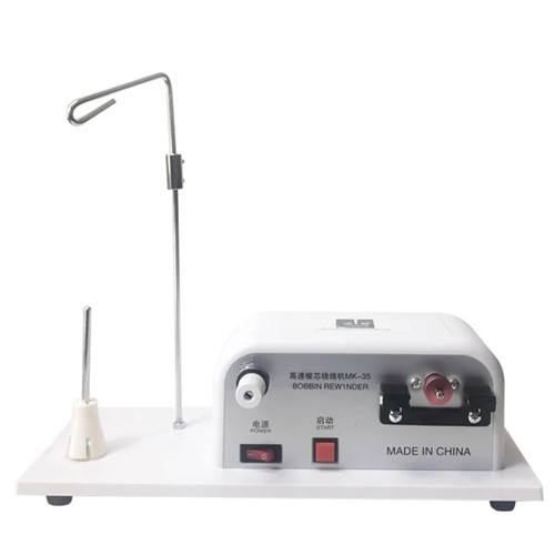 Sewing machine bobbin - machine,