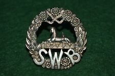 The South Wales Borderers Smaller Pattern Officer's Silver Cap badge - GAUNT