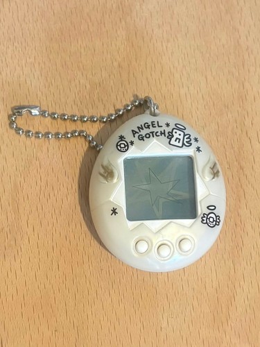 1997 tamagotchi angel gotchi - tamagotchi,