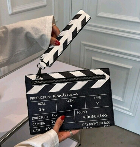 Movie clapper board shoulder - board,