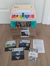 *Description* Baby Einstein Hape Magic Touch Piano Wooden Musical Toy Instrument