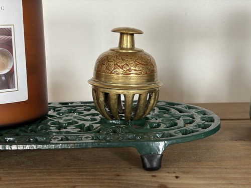 Vintage enameled solid brass