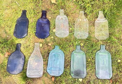 Flattened glass spirit bottles - glass,