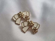 LOT OF TWO CHANEL WHITE ENAMEL