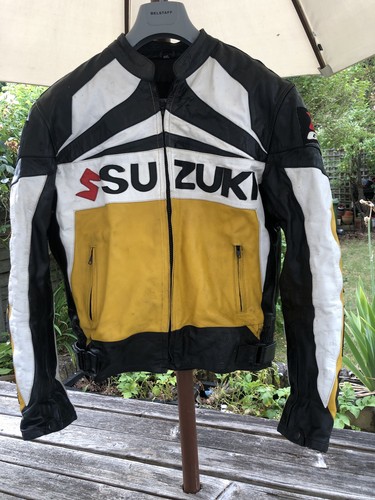 Yellow suzuki motorcycle - suzuki,