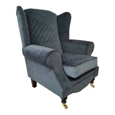 Wing Back Queen Anne Chair Grey Quilted Seating area with plain grey soft fabric