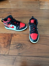 Red and black Nike Jordan