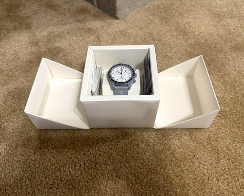 Swatch omega - x,