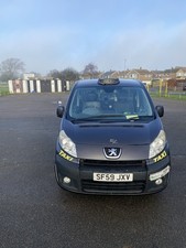 Puegout E7 Taxi (2009) For