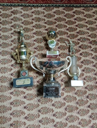 Vintage trophies with - x,