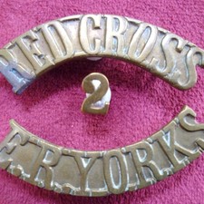 THE BRITISH ARMY RED CROSS EAST YORK'S REGIMENT BRASS SHOULDER TITLE