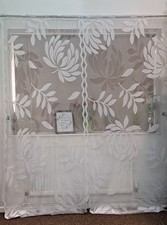 White jardiniere net curtains