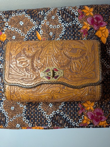 Cognac brown tooled leather