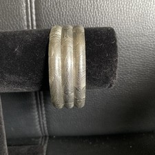 Set Of 3 Stacking Steel Bangles Engraved With A Geometric Line Design