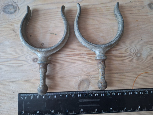Pair vintage metal captive - of,
