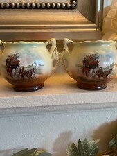vintage pair of urn style vases/pots with coaching scene