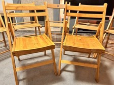 8 wooden folding chairs (6