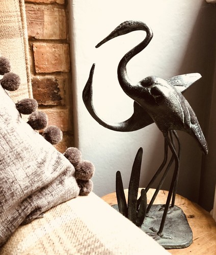 Two cast iron - cast, cranes
