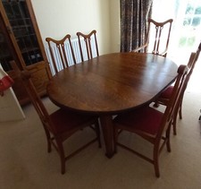 Oval Arts & Crafts Oak Dining Table & Wylie & Lochhead Chairs in Egyptian Style