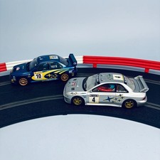 SCALEXTRIC SUBARU IMPREZA C2412 & C2236W SLOT CAR X2 HORNBY RACING