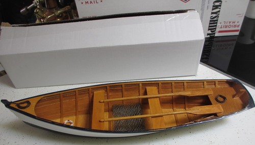 Wooden row boat skif - row, dory