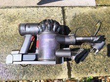 Dyson DC59 Cordless Handheld -- with charger, dock base and brush tools