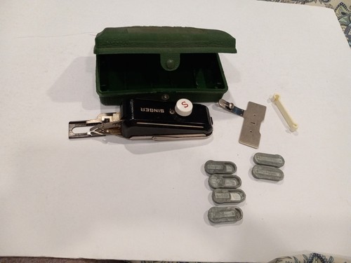 Singer sewing machine button - machine,
