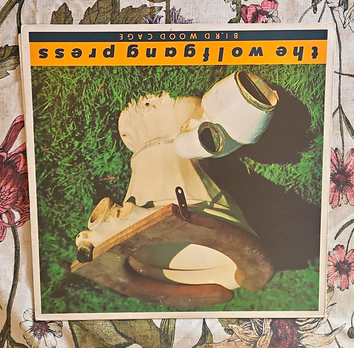 The wolfgang press bird wood - press,