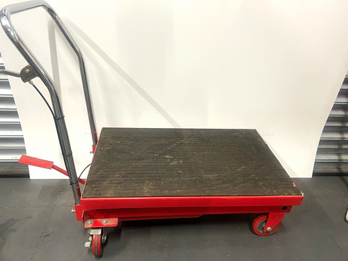 Red hydraulic scissor lift - hydraulic,